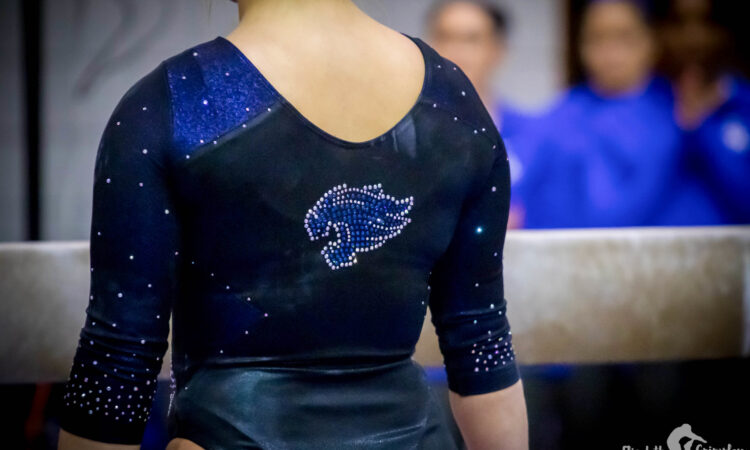Kentucky gymnast before mounting the beam
