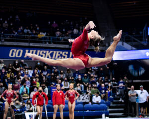 Jaylene Gilstrap performs a switch ring leap.