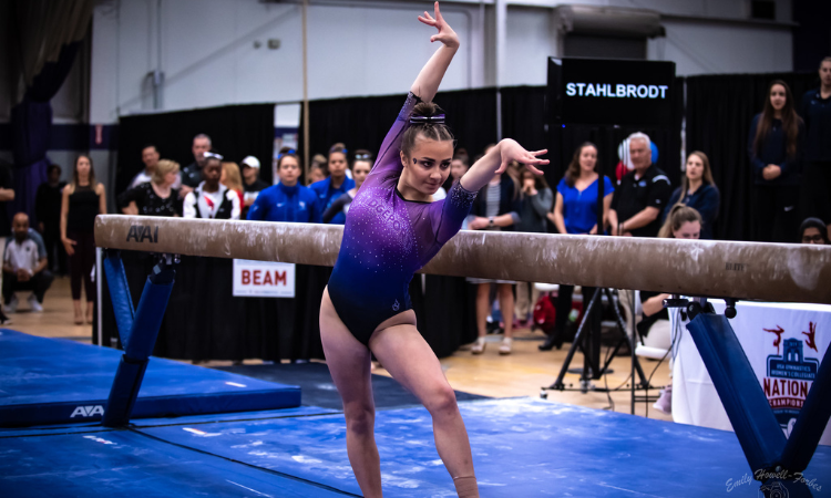 Julianna Roland competes on beam at the 2019 USAG Event Finals.