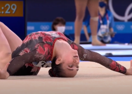 Ava Stewart does her ending pose of her floor routine
