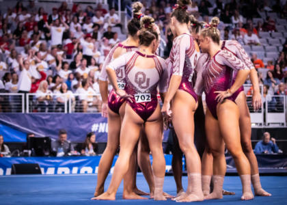 The Oklahoma floor lineup huddles before the start of the rotation