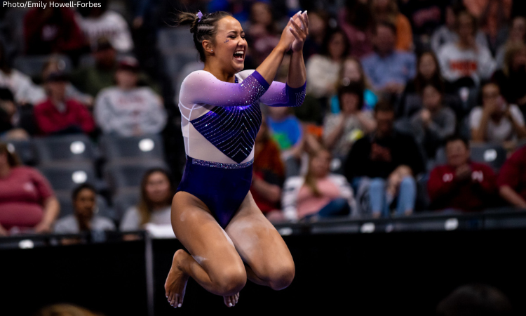 Aleah Finnegan celebrates while competing for LSU.