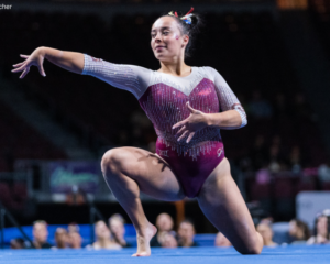 Faith Torrez does a pose on floor during her routine