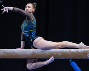 Natalie WOjcik does on-the-beam choreography during her routine