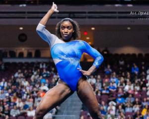 Chae Campbell competes on floor for UCLA.