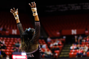 JerQuavia Henderson salutes after her floor routine
