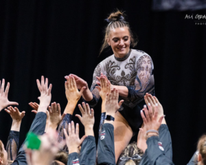 Josie Angeny gets high-fives from the Gymdogs.