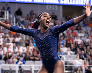 Derrian Gobourne begins her royal floor routine at the 2023 NCAA semifinals.