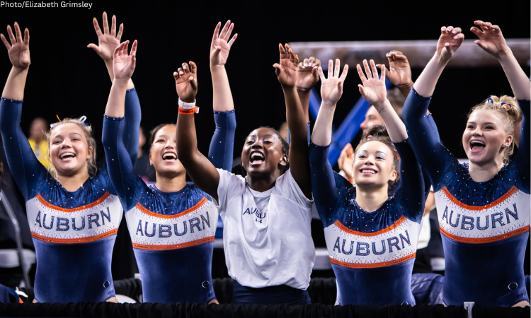 Auburn gymnasts celebrate at the 2022 NCAA Women's Gymnastics Championships