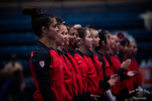 Utah Gymnasts stand in a line