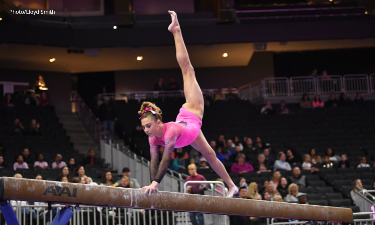 Quin Kuhl competes on beam at the Nastia Liukin Cup