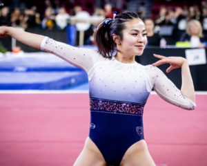 Malia Hargrove poses on floor