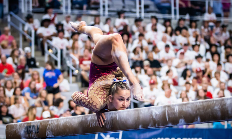 Audrey Davis competes on the balance beam for Oklahoma at the 2023 NCAA Women's Gymnastics Championships