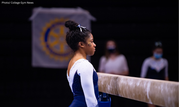 Keanna Abraham waiting to compete on beam.