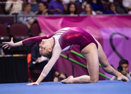 alabama's chloe lacoursiere does a pose on floor