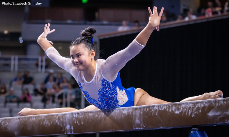 Florida's Ellie Lazzari does a straddle mount on beam