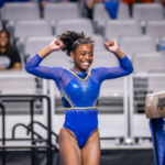 UCLA's Selena Harris celebrates at the 2023 NCAA Women's Gymnastics Championships