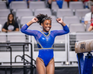 UCLA's Selena Harris celebrates at the 2023 NCAA Women's Gymnastics Championships