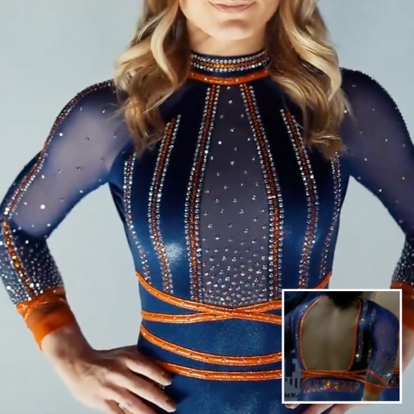 A navy blue leotard accented with bold orange details and shimmering rhinestones. The sheer navy sleeves are embellished with scattered crystals and finished with bright orange cuffs. Vertical rhinestone lines cascade down the bodice, creating an elegant, elongating effect. The high neckline features an orange and crystal choker-like design, while the waist is cinched with sparkling orange crisscross accents. The back showcases a dramatic open cut framed by matching orange trim.