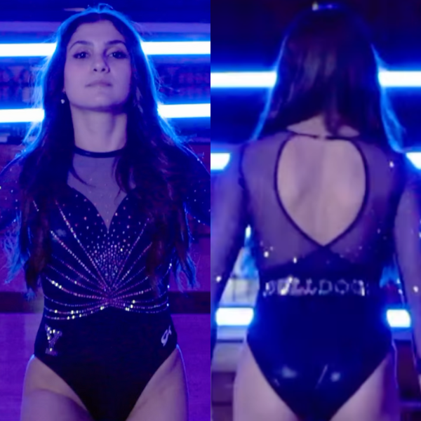 A navy leotard with a sweetheart neckline design. There are rhinestones fanning out from the belly button area, sort of like a butterfly. The back is open with a thin strap at the top and the word "Bulldogs" below the keyhole. On the front hip, there is a Yale Y logo.