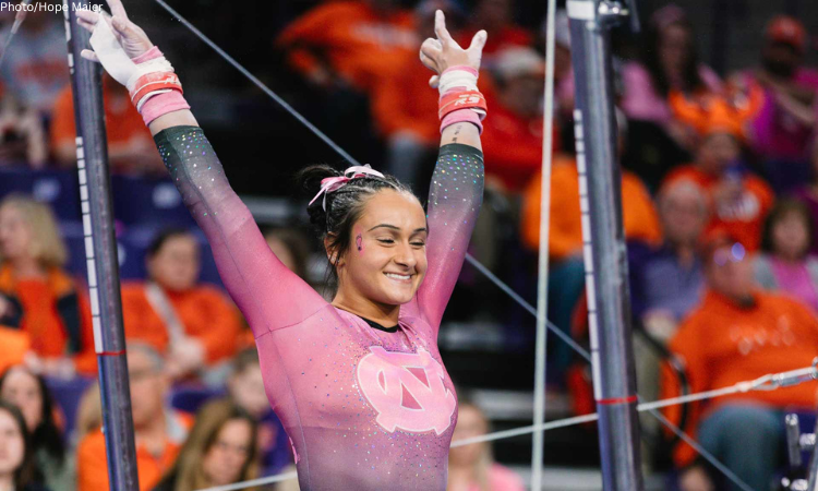 Lali Dekanoidze salutes after her bars routine.