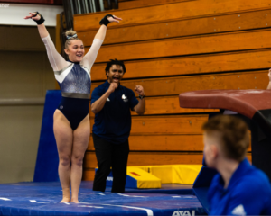 Taylar Schaefer saluting after her vault