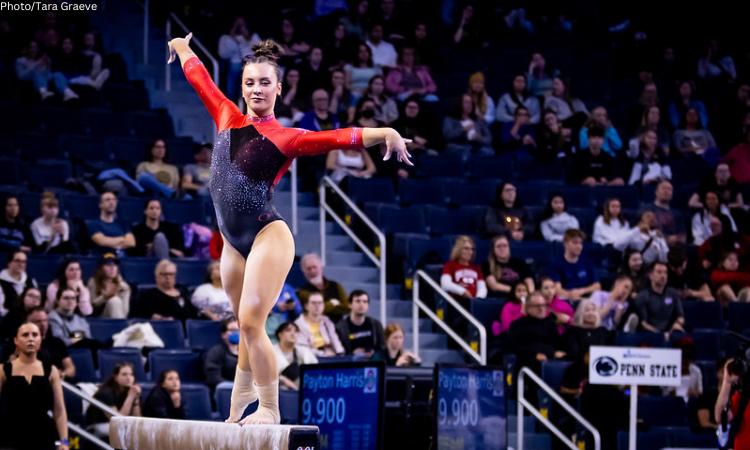 Tory Vetter performs on beam.