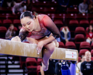 Kara Eaker holds the beam mid- choreography.