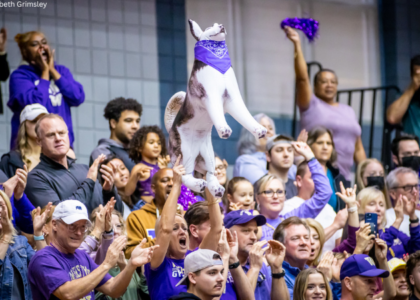 Washington fans celebrate at a quad meet at TWU in March 2023