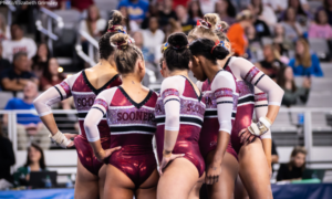 Oklahoma gymnasts huddle together