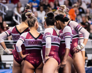 Oklahoma gymnasts huddle together