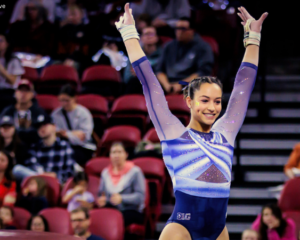 Sophia Diaz saluting after vault
