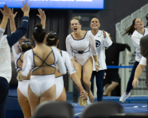 Elizabeth Leary celebrates with her team