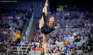 Helen Hu competes on beam