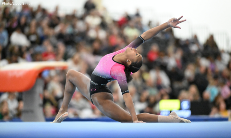Kelise Woolford poses on floor