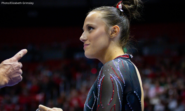 A close-up of Ella Zirbes Utah, as she talks to her coach