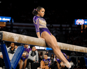 Konnor McClain looks pensive during her choreography on the beam.