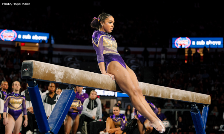 Konnor McClain looks pensive during her choreography on the beam.