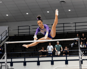 Kailin Chio on bars