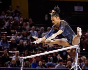 Anya Pilgrim flies above the bars right before making a catch on her release.