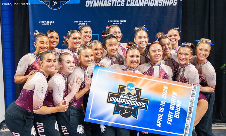 The Oklahoma gymnastics team poses with a oversized ticket that says Fort Worth bound.