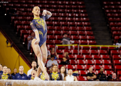 Tonya Paulsson competes for Cal on beam